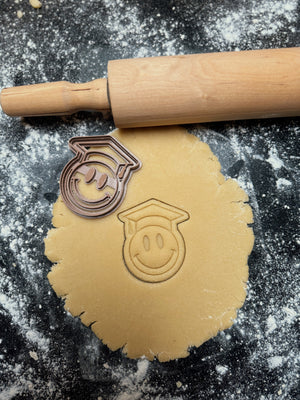 Smiley met afstudeerhoed